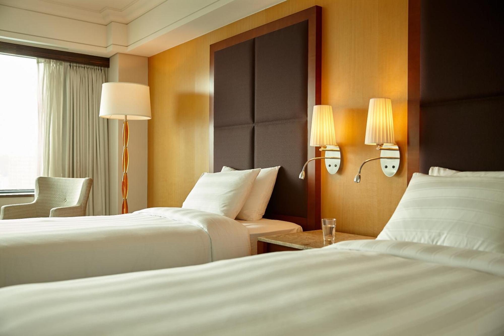 Lotte Hotel Пусан Екстер'єр фото A room at the hotel